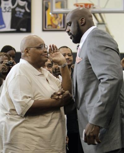 neal harrison shaq shaquille phillip moving chapter next sarge his nwitimes arrives greets conference father friday left right he