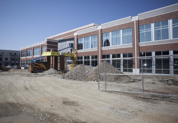 Concrete poured for walkways outside new Crown Point Library