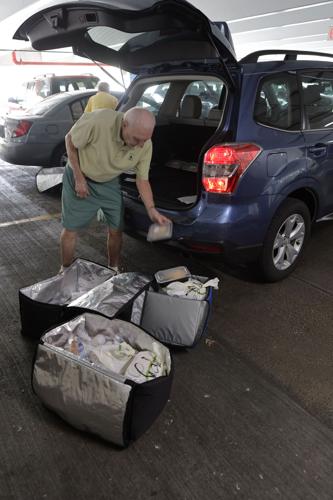 Palos Hospital volunteers serve a side of kindness with the meals they deliver