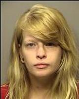 Woman busted on drug charges after man found overdosing at local hotel, cops say