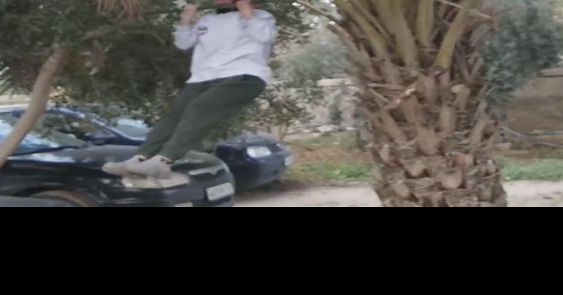 Schererville personal trainer helps Libyan woman learn a chin-up