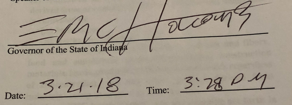 Here it is — Gov. Eric Holcomb's signature that officially