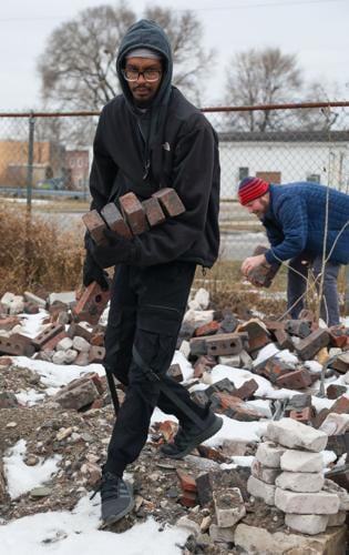 Bricks from the old Hammond High School are given away