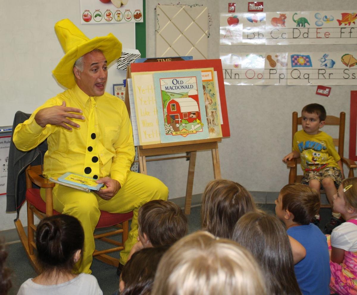 'Man in the Yellow hat' visits Crisman Elementary