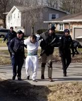 Man kicks in door to Portage home, hides in basement before being nabbed by SWAT team, cops say