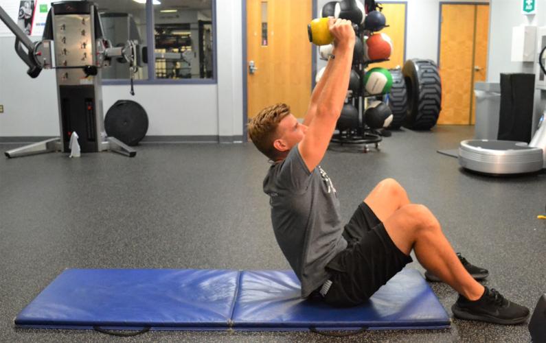 THIS WEEK'S EXERCISE Kettlebell pullover crunch