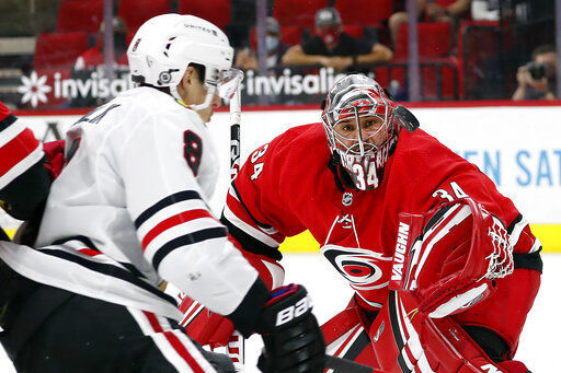 DeBrincat's OT score lifts Blackhawks past Hurricanes 2-1