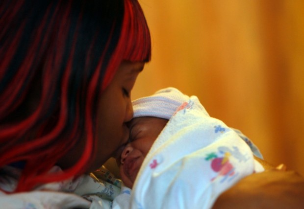 Surprised parents rush to name city's first baby of 2010