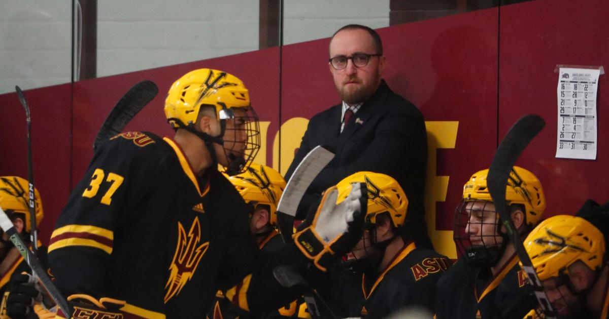 Arizona State hockey head coach Greg Powers watches his team as they ...