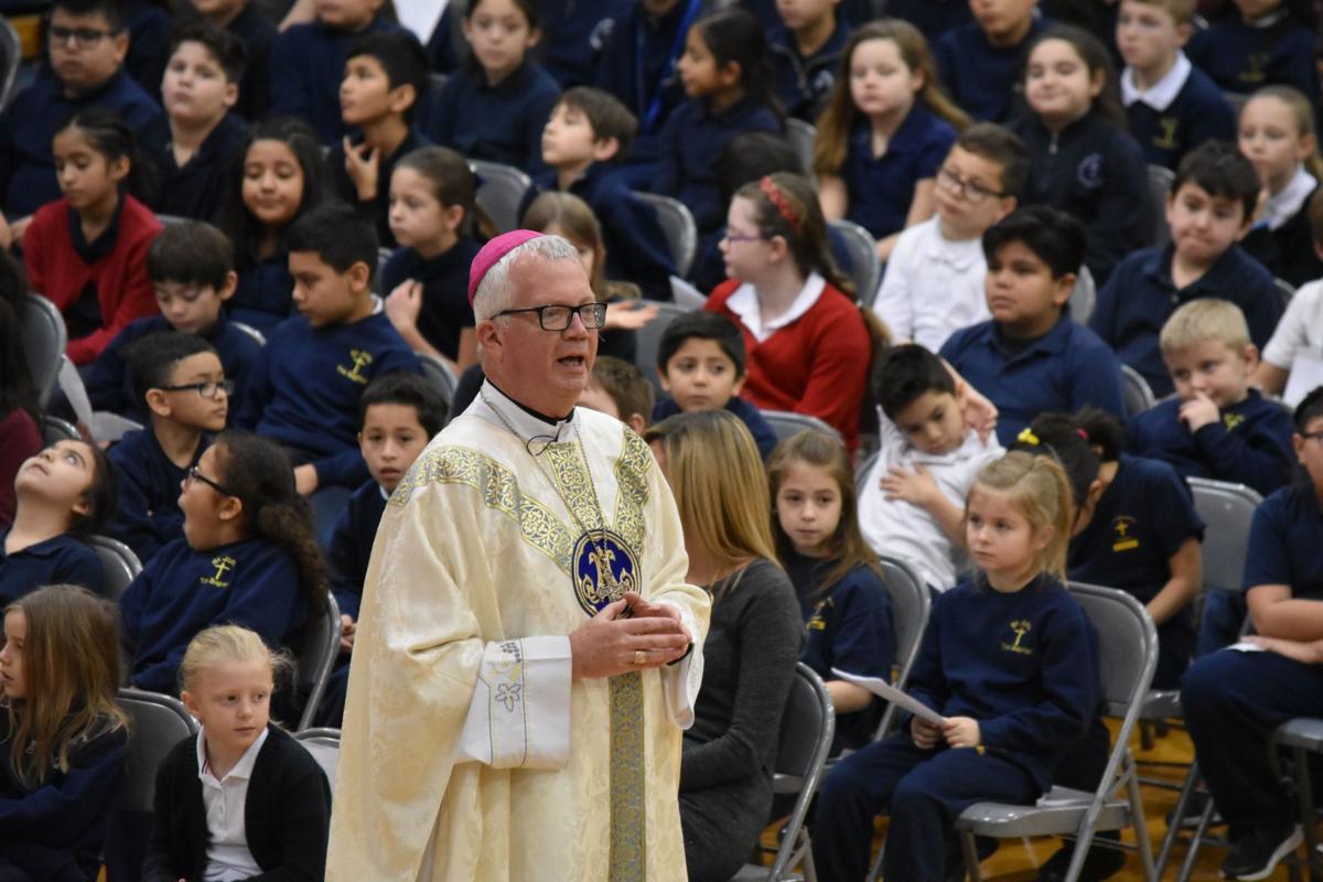Bishop Noll celebrates Mass with bishop