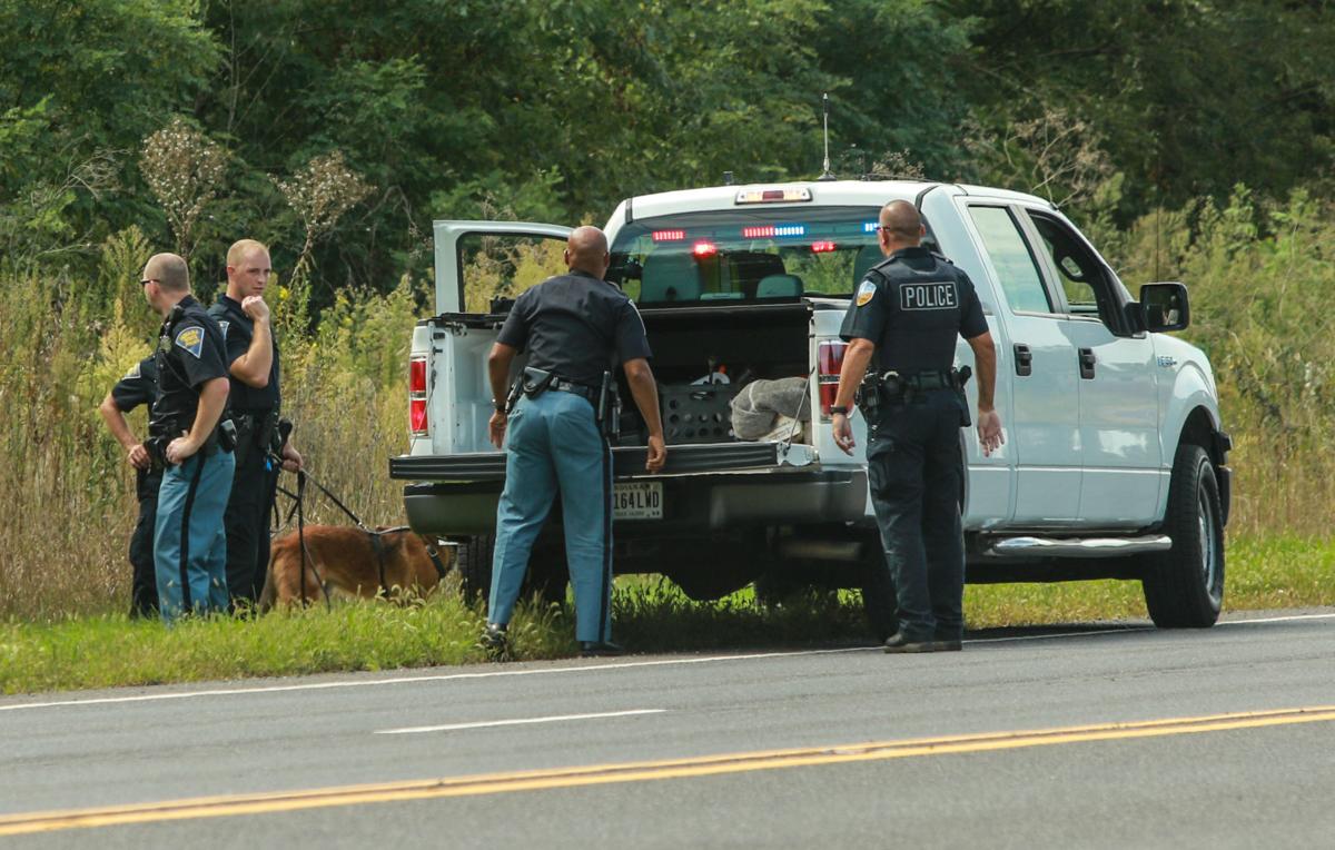 UPDATE Manhunt continues; triggered after firearm tossed from vehicle