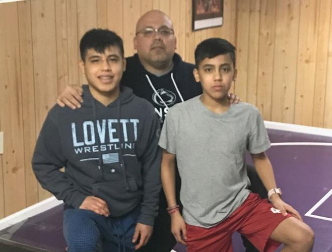 Wrestling coach, homeless community team up to honor former