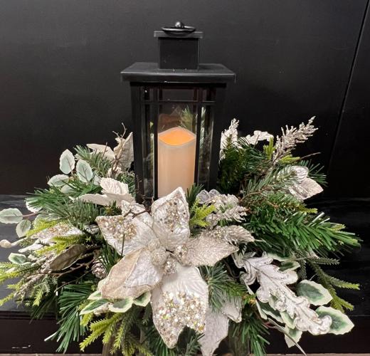 Florists start with the green and add the feelings to create holiday magic