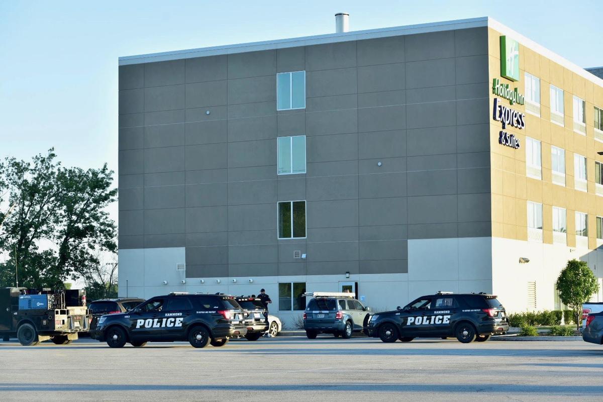 Four people interest taken into custody Hammond hotel after man