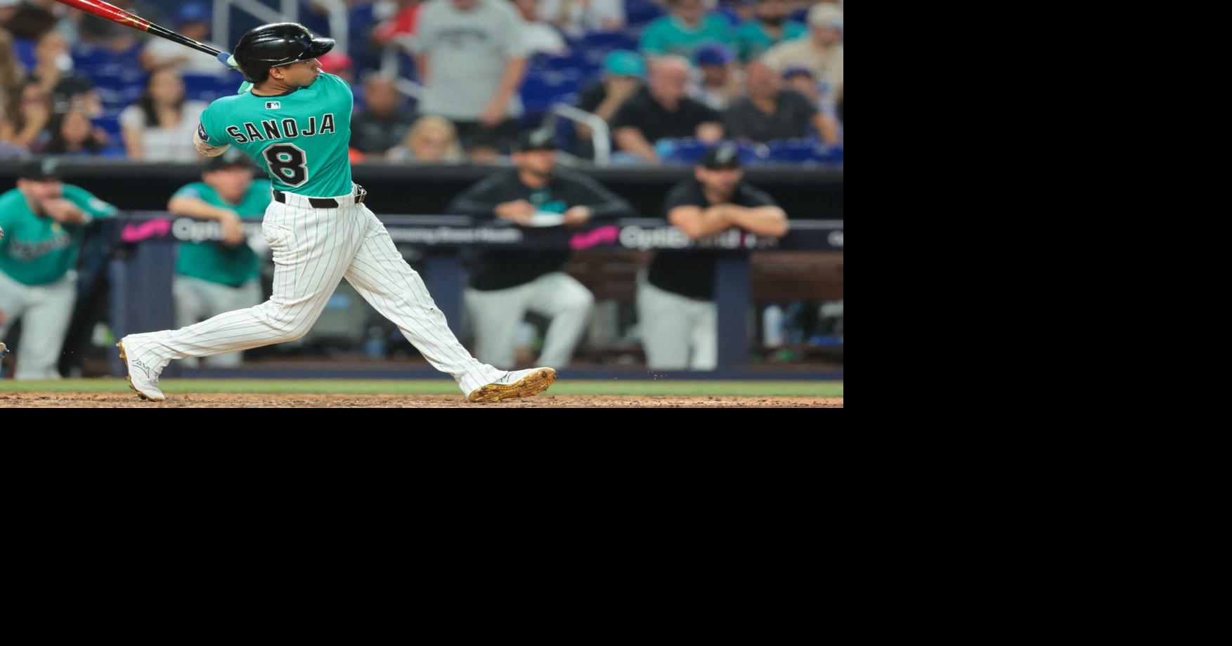 Marlins break out on offense to salvage finale versus Cubs