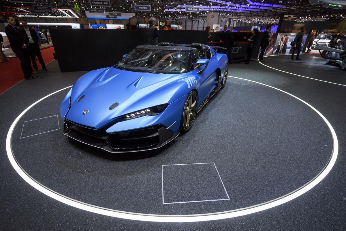 Highend sports cars gleam at Geneva auto show. Bring money Cars