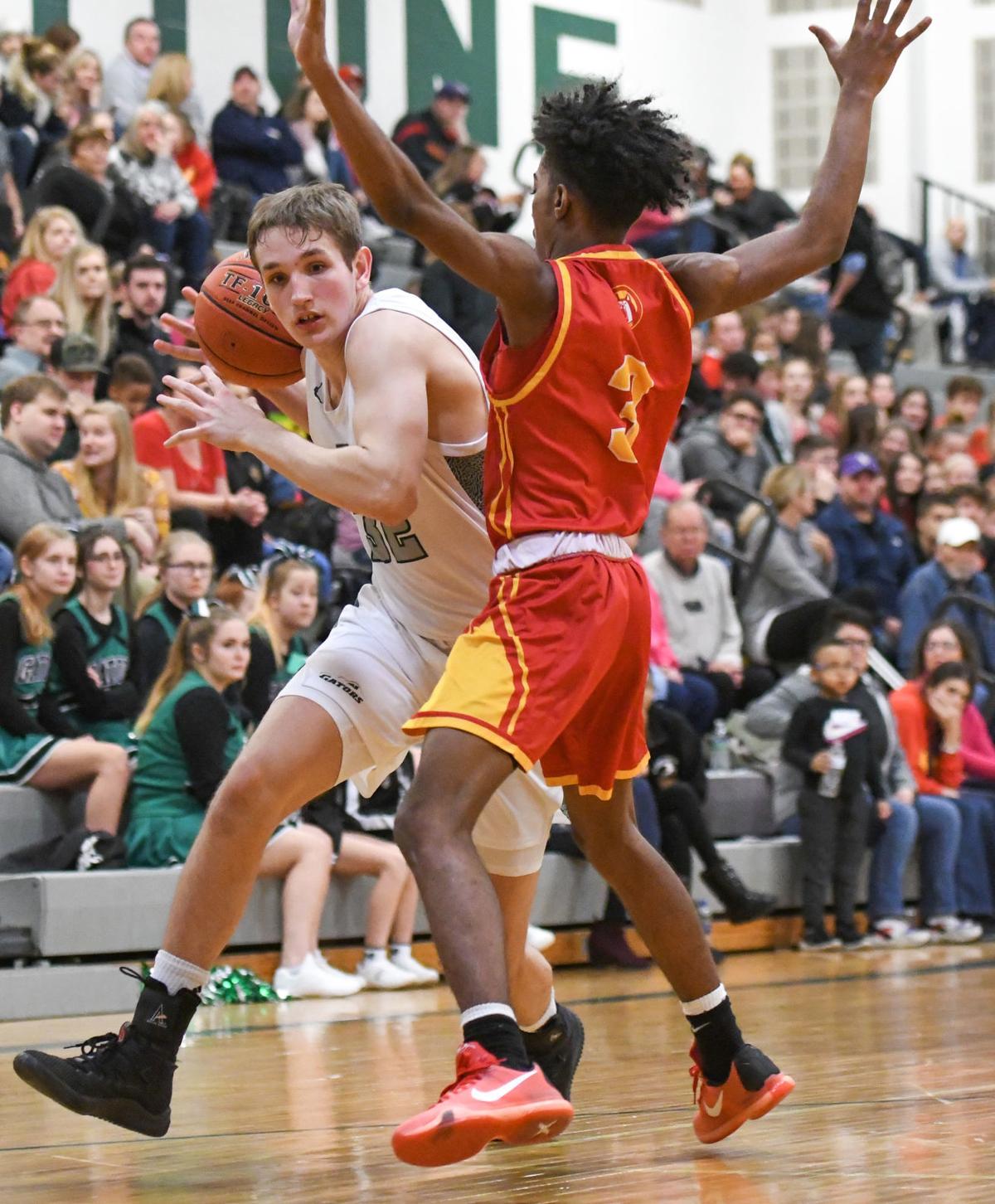 Gators Chomp Huskies In First League Meeting 47 43 Olean