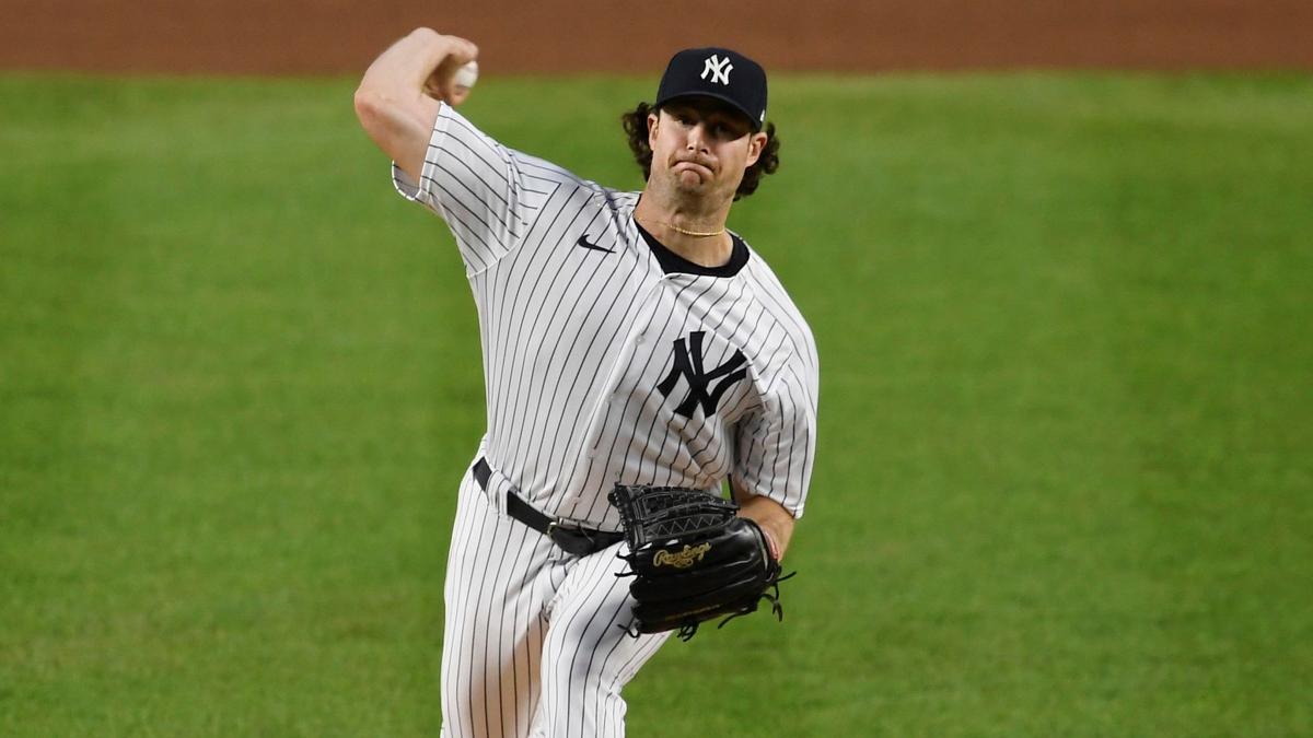 Yankees ace Cole throws plenty of pitches in 1st spring game