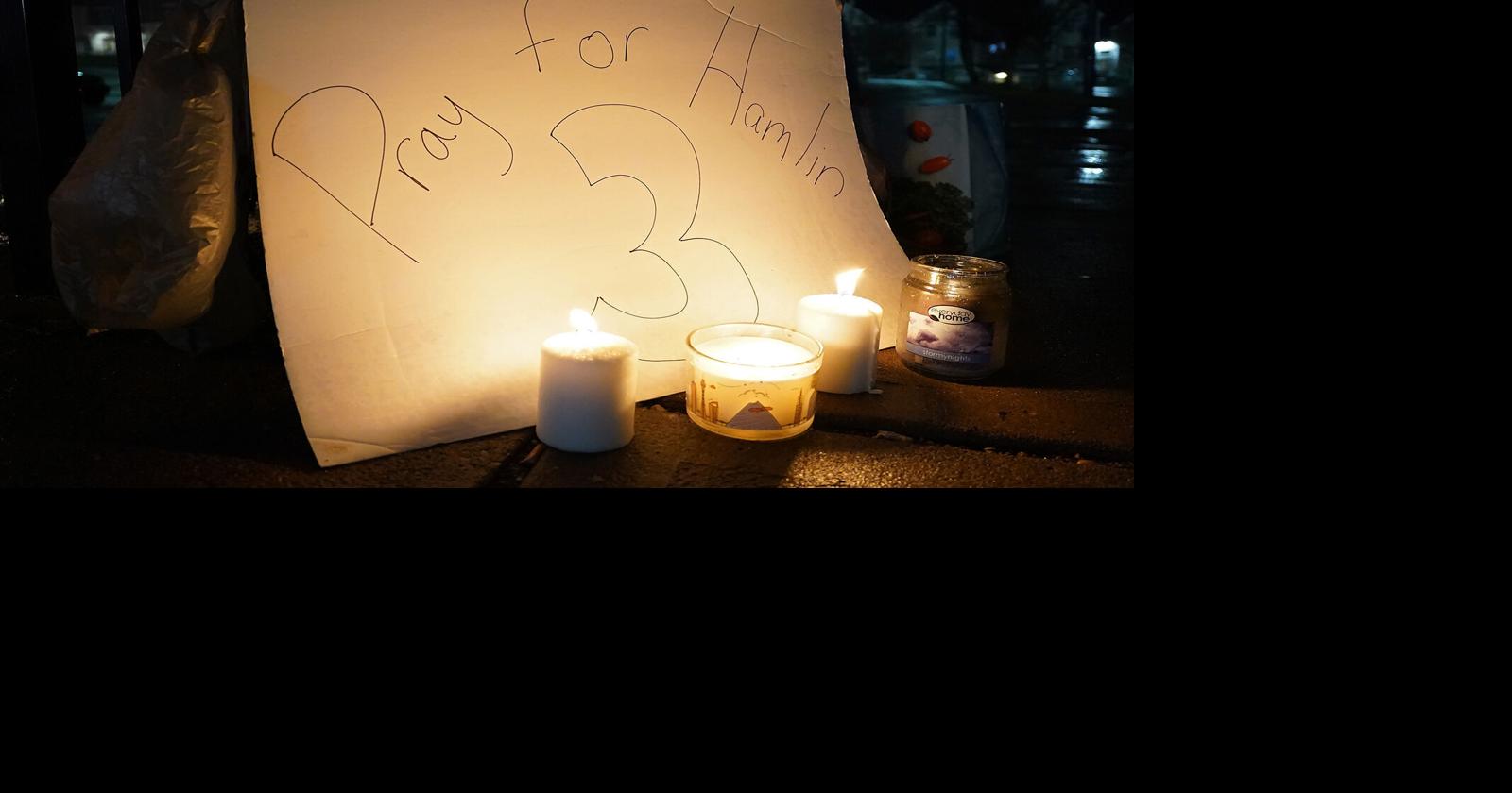 Damar Hamlin at Cincinnati hospital as fans hold vigil after injury