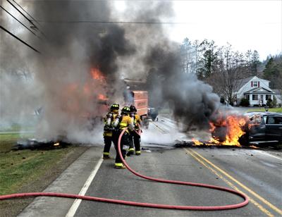 bradford accident oleantimesherald extinguish afternoon firefighters suv flames collided heavy washington tuesday truck tree west service street work after