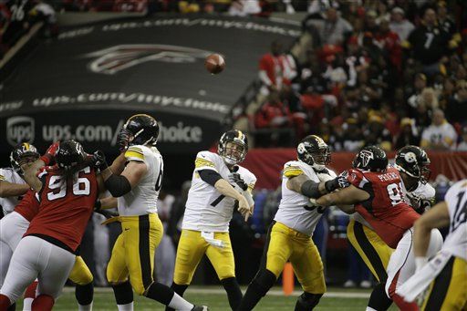 Pittsburgh Steelers Hines Ward (86) pulls in a pass from quarterback Ben  Roethlisberger during the first