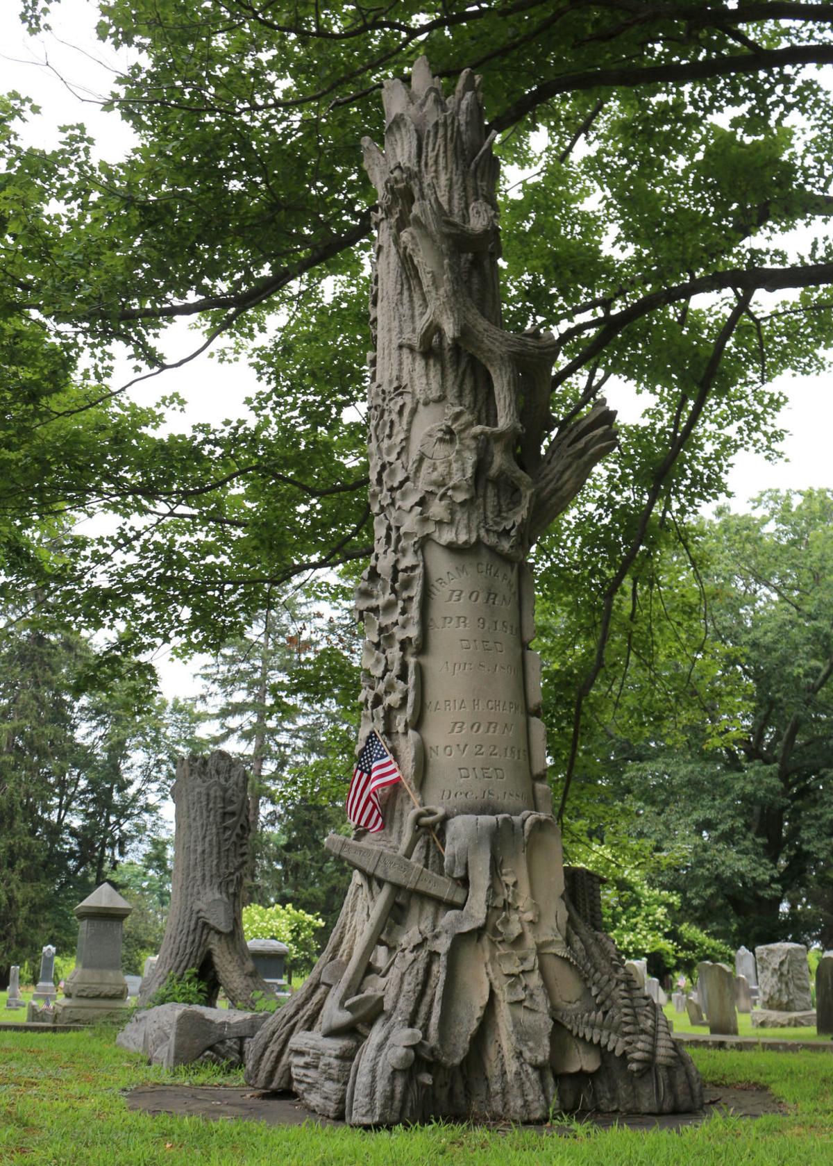 Unusual gravestone in Versailles Cemetery looks like a stone tree