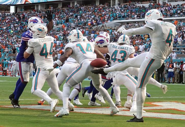 Dolphins halt Allen, survive 'butt punt' to beat Bills