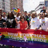 LGBTQ+ Pride revelers flash feathers, flags from NY to San Francisco | News