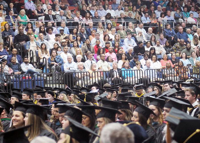 Fr. Riley honored with doctorate, surprise Schumer speech at St