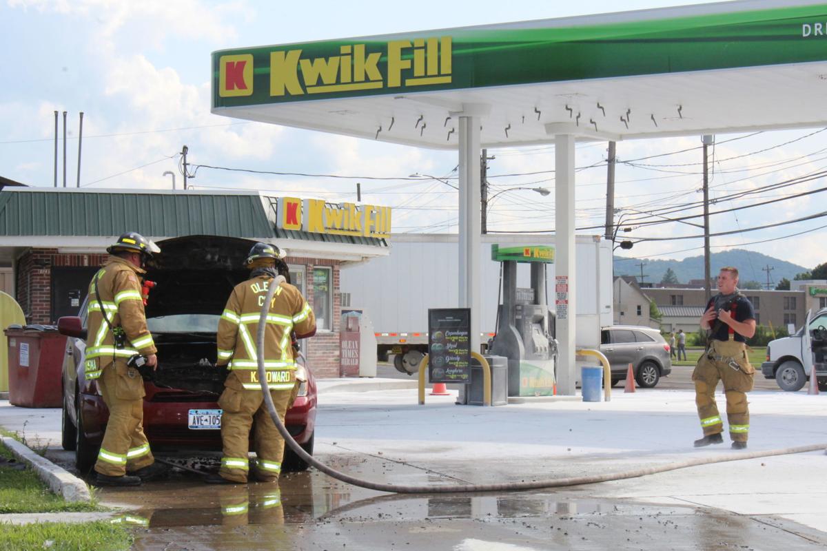 Vehicle fire at Olean Kwik Fill sets off fire suppression system