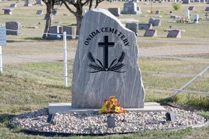 An engraved granite stone was installed in 2015 marking the entrance to the Onida Cemetery.