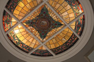 Stained glass conservators were able to re-create the missing panel and center medallion, restoring the skylight to its appearance when the courthouse was completed in 1912.