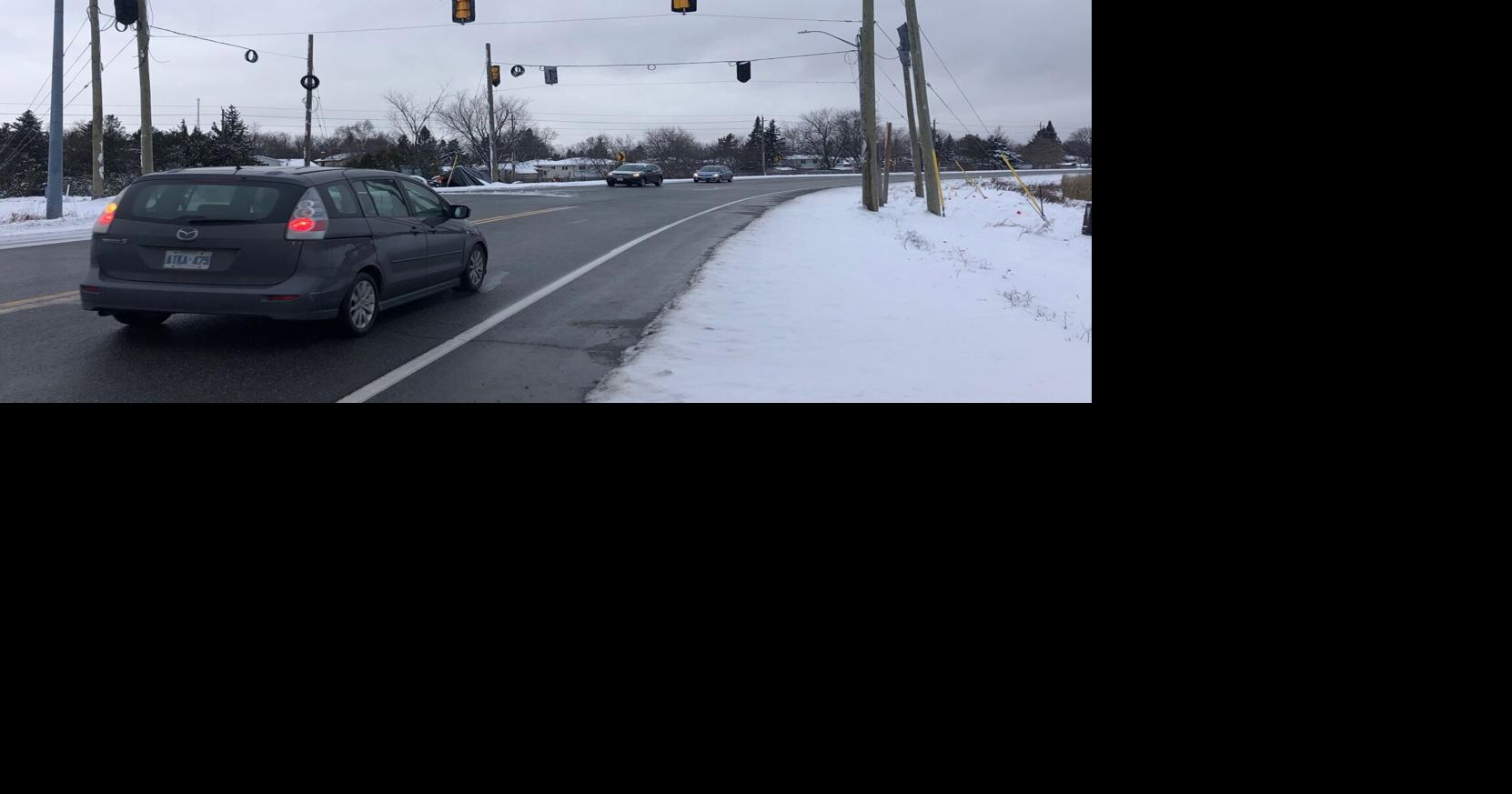 WHAT’S GOING ON HERE? Traffic lights coming to intersection where