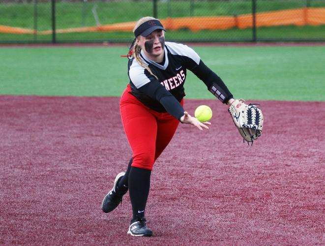 Lily Riley helps put smiles on the faces of her Oregon City softball