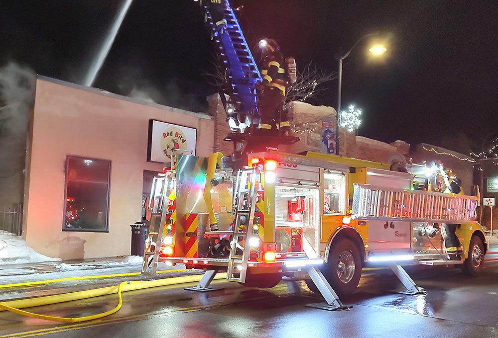 Fire destroys building downtown Osceola, home to Red Bird Music Store