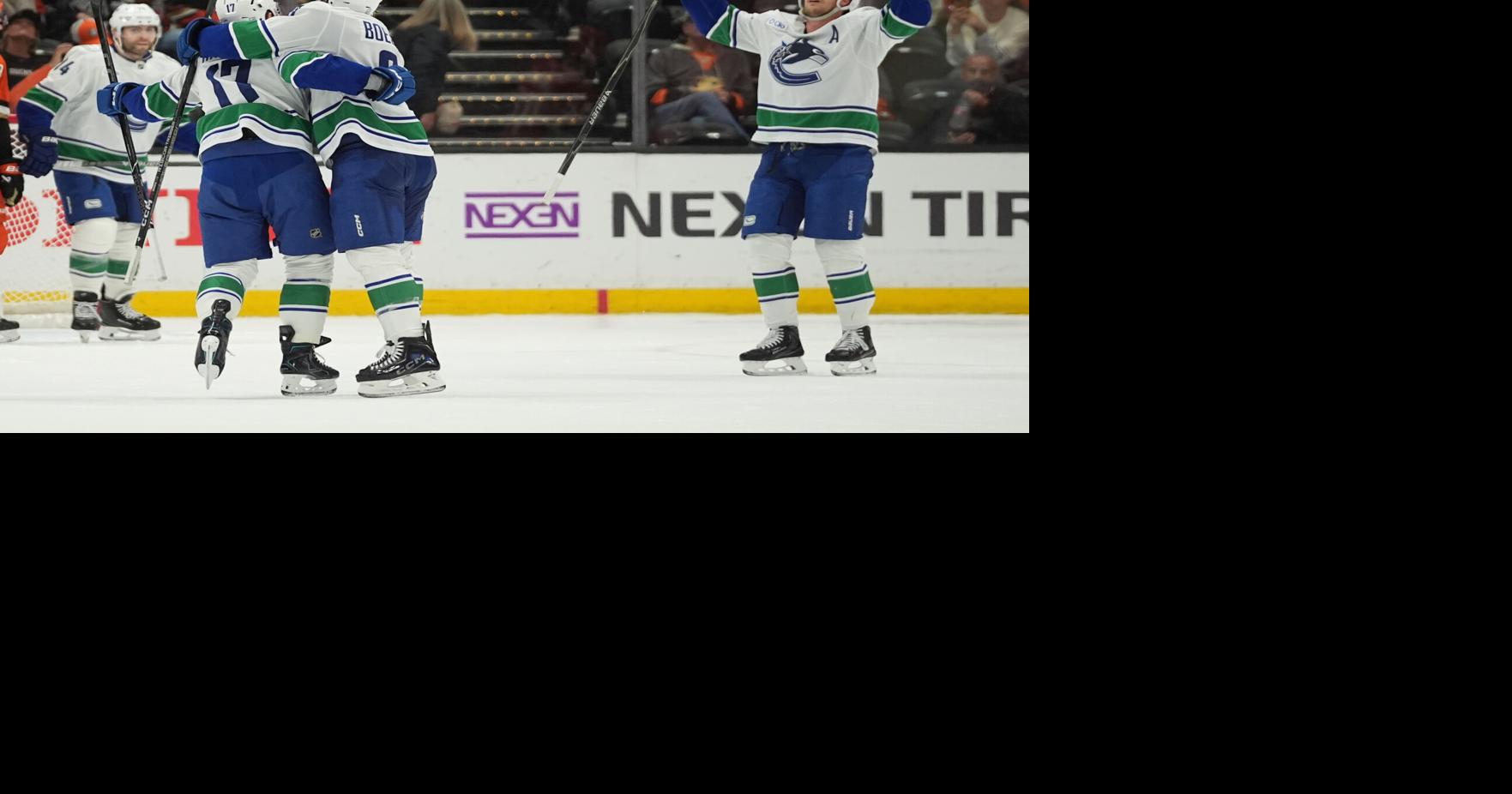 Hronek's OT power-play goal caps the Canucks' 6-5 comeback win over the Ducks