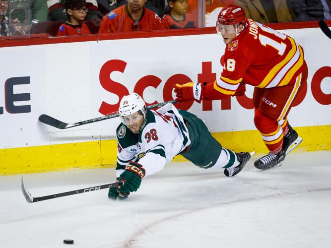Cooley makes 36 saves in the Flames' 2-1 victory over the Wild ...