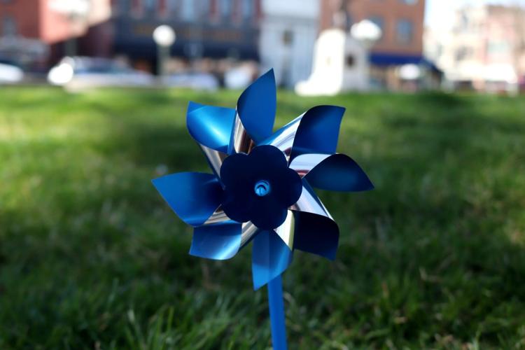 Osky Town Square decorated with pinwheels in light of National