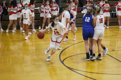 Frost dribbles the ball