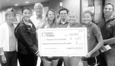 Compass Credit Union makes donations to youth sports | Local