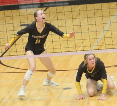 Sister act dominates All-Courier volleyball season