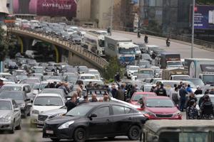 Protesters block Beirut roads after Cabinet approves new taxes that raise fuel prices