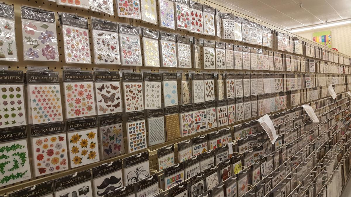 Shelves being stocked inside Hobby Lobby News