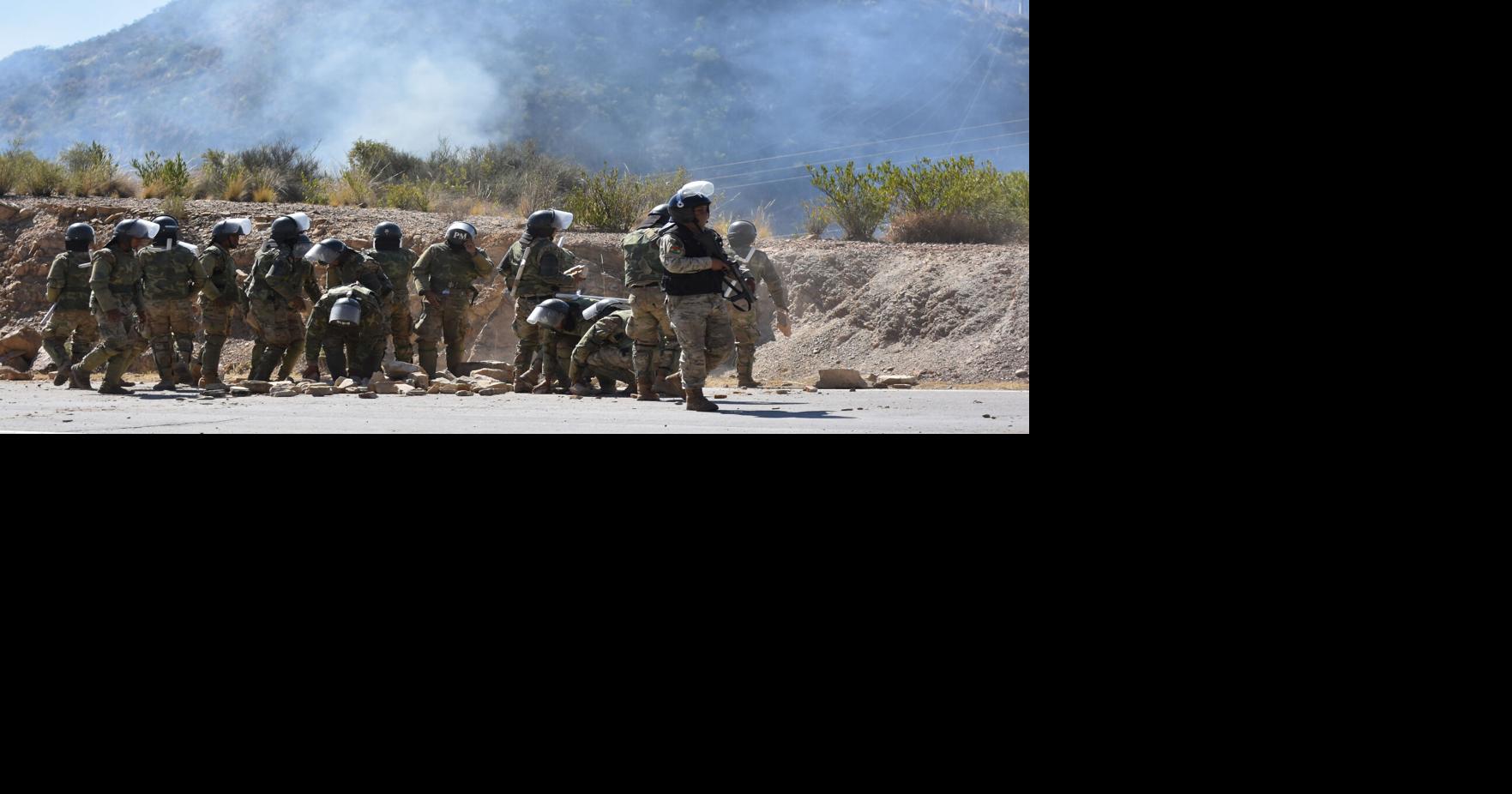 Bolivia clears anti-government roadblocks after emergency decree, as patrol plane crash kills 6