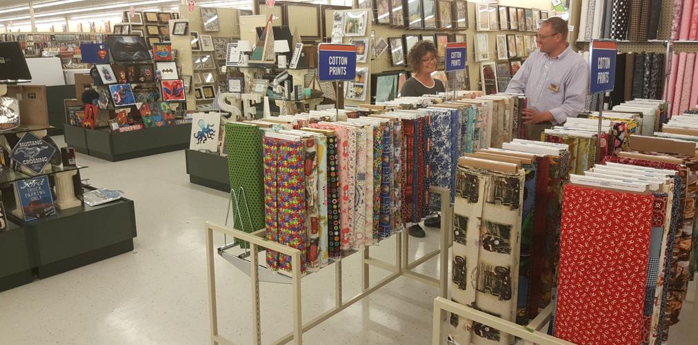 Shelves being stocked inside Hobby Lobby | News ...