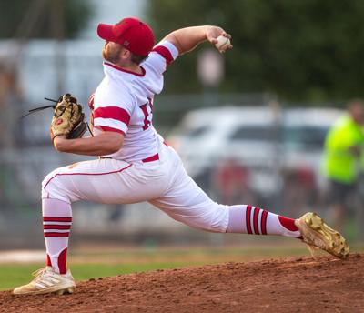 Tuttle pitches Big Reds to fourth straight win