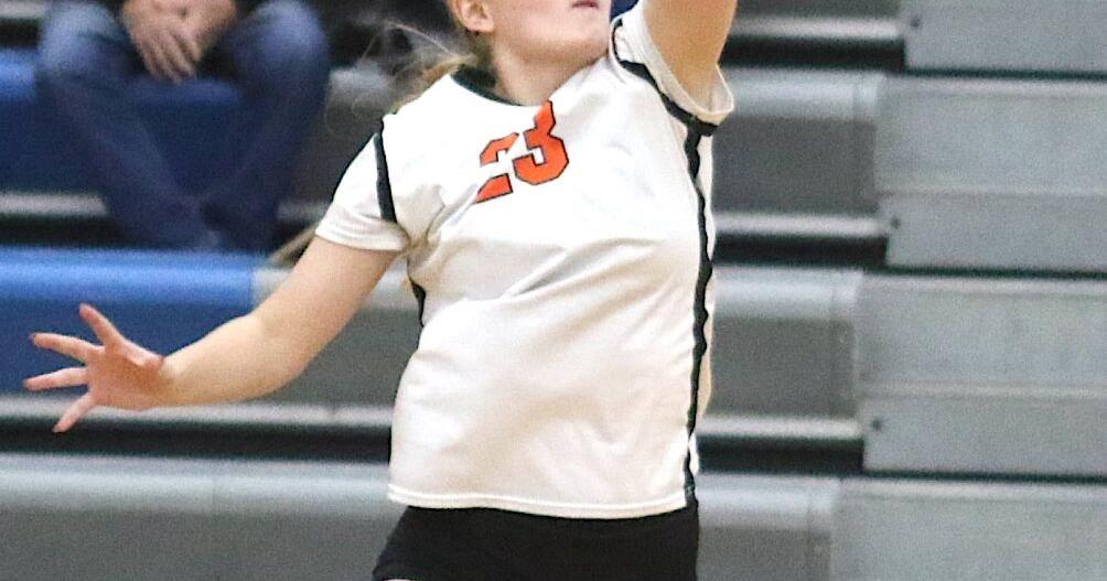 Prep volleyball: Trojans cap off regular season with thriller
