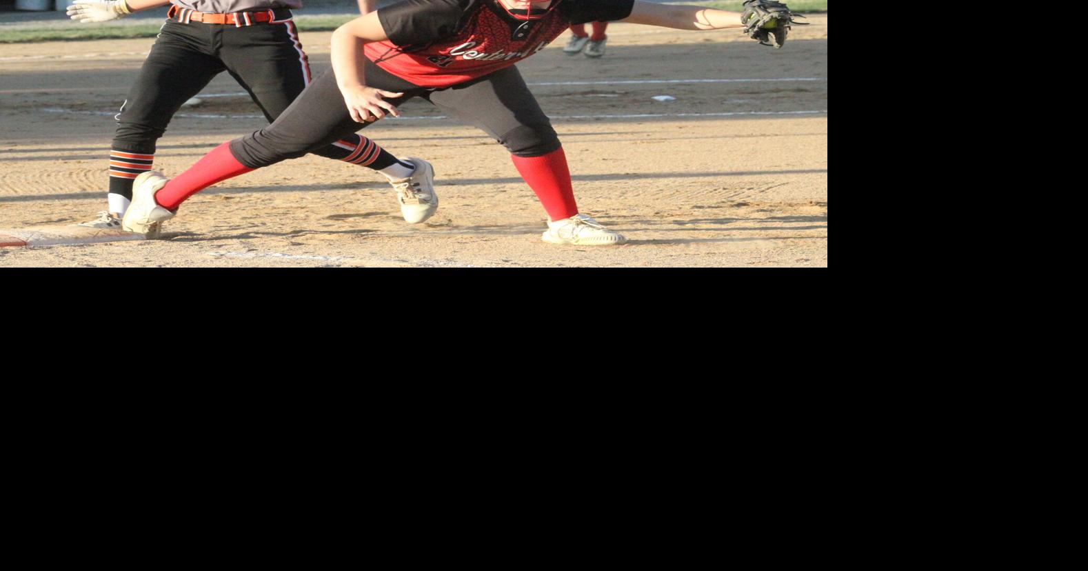 Prep softball: Redettes take duel from Trojans
