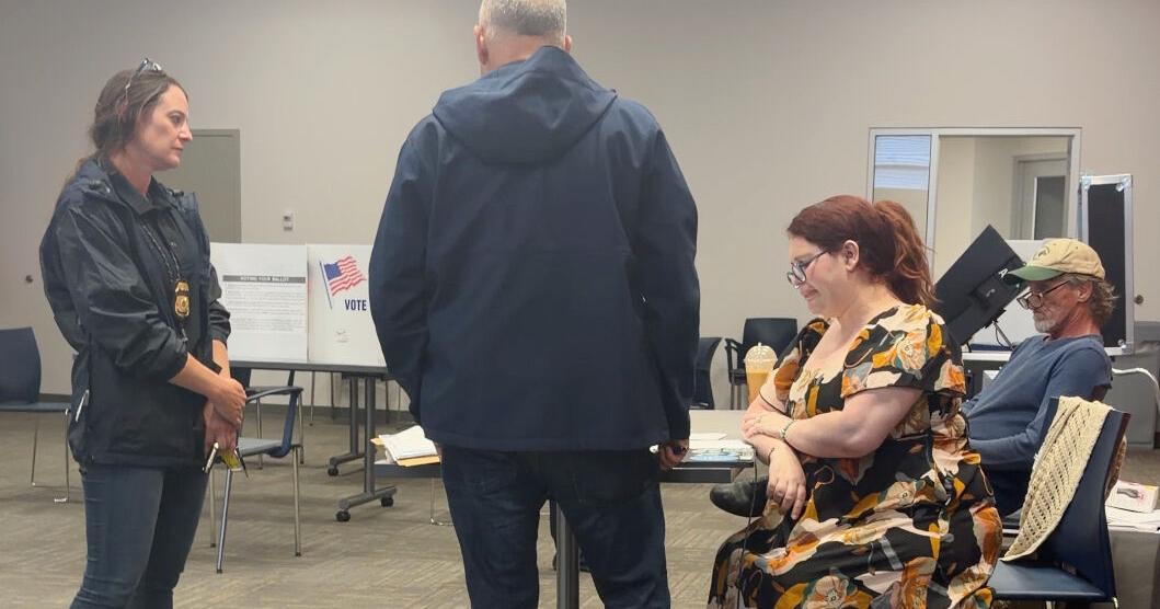 Election worker says federal officers confronted her at polls over social media post criticizing ICE