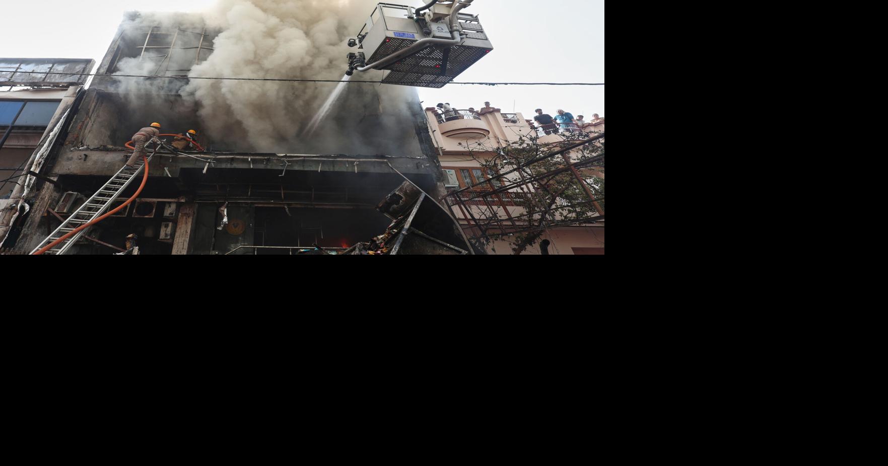 Fire tears through building in northern India, killing 14, mostly students